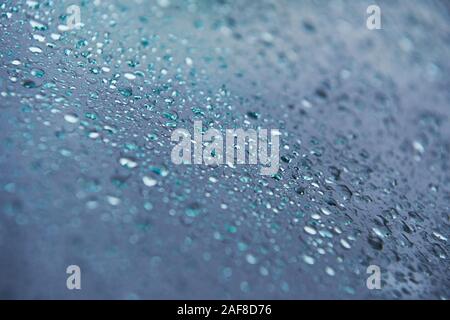 Drops of water on the wet glass. Rainy weather Stock Photo