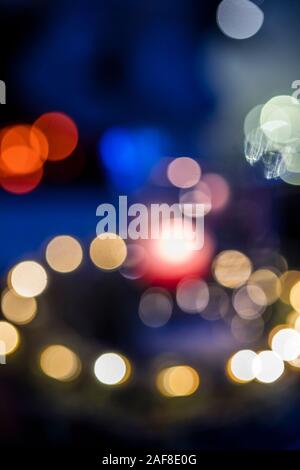 Bokeh created by blurred Christmas lights Stock Photo