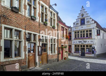 Cobbled alley with restaurants in the district Patershol in the city Ghent / Gent, East Flanders, Belgium Stock Photo