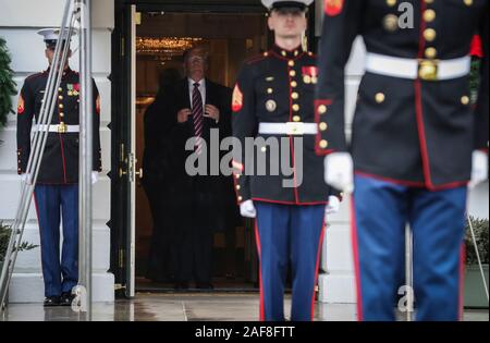 President Donald Trump waits to welcome Paraguay’s President Mario Abdo Benítez on the South Lawn of the White House on December 13, 2019 in Washington, DC. (Photo by Oliver Contreras/SIPA USA) Stock Photo