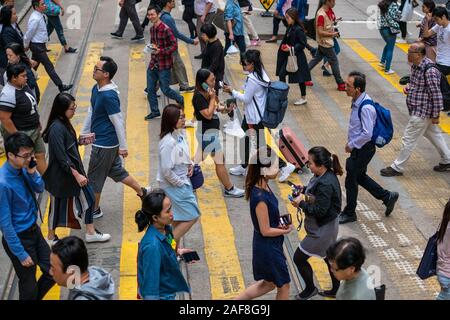 HongKong - November, 2019: Young man running from tear gas during the