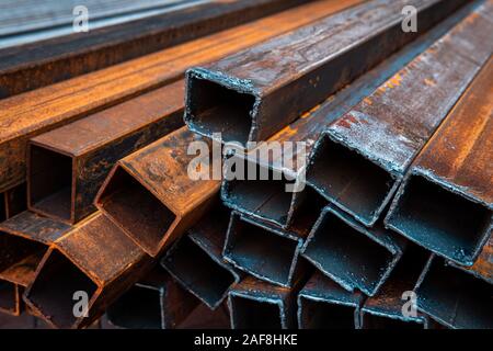 Steel bar for construction.Metal pipe profile. Stock photo of metal beams. Stock Photo