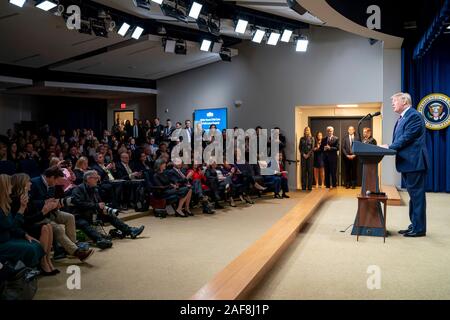 Washington DC, USA. 12 December, 2019. U.S President Donald Trump delivers remarks at the White House Summit on Child Care and Paid Leave: Supporting America’s Working Families on in the South Court Auditorium of the Eisenhower Executive Office Building at the White House December 12, 2019 in Washington, DC.   Credit: Tia Dufour/White House Photo/Alamy Live News Stock Photo