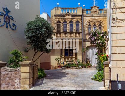 Picturesque Mediterranean cottage and patio in Xaghra village, Gozo, Malta. Stock Photo