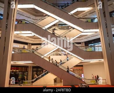 Genting Mall , Malaysia - November 2019 : Escalators in modern shopping mall in asian malaysian muslim Stock Photo