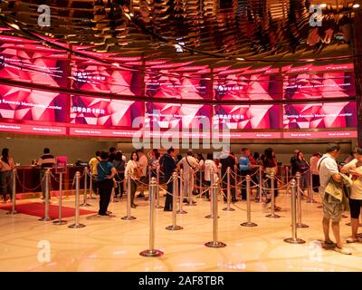 Genting , Malaysia - November 2019 : Sky casino Genting members services counter people in ques Stock Photo
