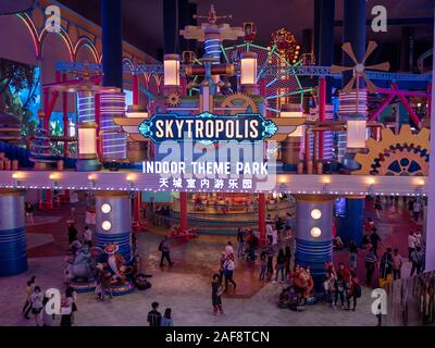 Genting , Malaysia - November 2019 : Indoor playground theme park long shot people inside colorful Stock Photo