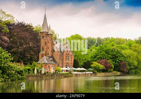 Panoramic view of Lake of Love surrounded by the trees and flora of Minnewater Park in the old city of Bruges. Belgium Stock Photo