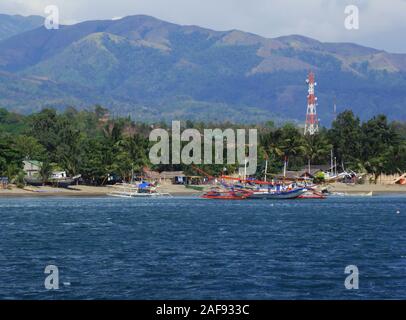 Bangkas (or bankas), traditional outrigger wooden boats used by the Filipino artisanal fishermen Stock Photo