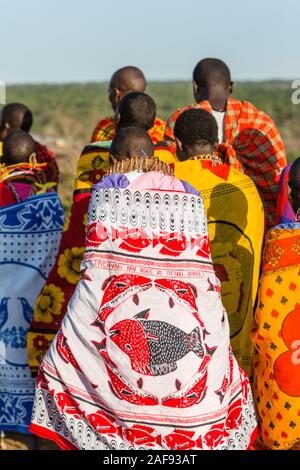 Tanzania. Maasai Village of Ololosokwan, Northern Serengeti. Clothing of  Villagers Performing Welcoming Dance. Stock Photo