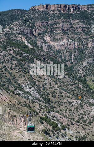 Divisadero, Copper Canyon, Chihuahua, Mexico.  Aerial Gondola en Route over Copper Canyon. Docking Station at top of Cliff. Stock Photo
