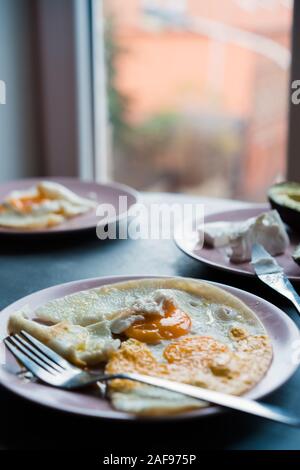 Vertical frame breakfast consisting of scrambled eggs for two persons Stock Photo