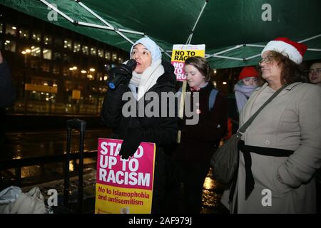 Manchester, UK. 13th December, 2019.  A small demonstration against Prime Minister and conservative party leader Boris Johnson.  The 'Not My PM' event was called after the news that the Tory party had won in the General Election.  Similar protests have been called in other cities.  St Peters Square, Manchester, Lancashire, UK. Credit: Barbara Cook/Alamy Live News Stock Photo