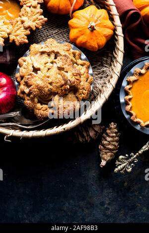 Gluten Free Mini Pumpkin and Apple Pies. Stock Photo
