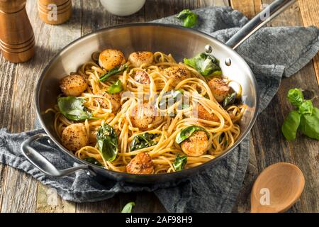 Homemade Italian Scallop Pasta with White Sauce Stock Photo