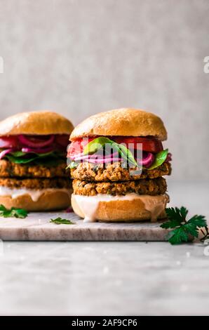 Sweet Potato Chickpea Burgers on a marble background Stock Photo