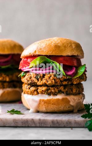 Sweet Potato Chickpea Burgers on a marble background Stock Photo
