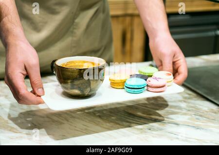 coffee and cookies on a tray Stock Photo