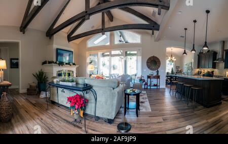 Panoramic view of newly built Ventura custom home with large open space from living room into kitchen on December 11, 2019 in Ventura, California, USA Stock Photo