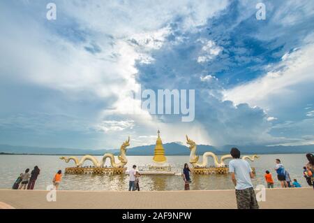 Phayao, Thailand - October 13, 2019: The Naga statue in Phayao lake (Kwan Phayao) with blue sky background. Stock Photo