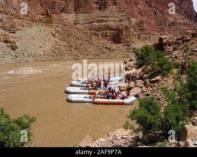 33' S-rig rafts on the shore of Cataract Canyon on the Colorado River in Canyonlands National Park in Utah. Stock Photo