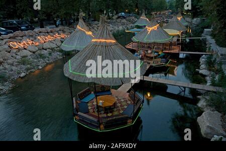 Over-the-river dining, river restaurant, retaurant on the river, Adrasan, Lykia, Turkey Stock Photo