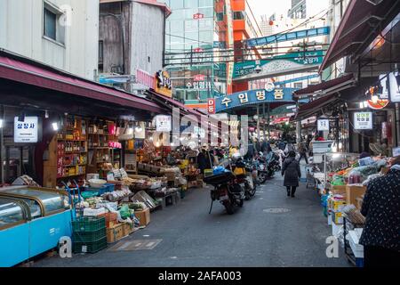 Seoul, South Korea - November 20th, 2019: Namdaemun market, popular attraction to buy street food and clothes. Stock Photo