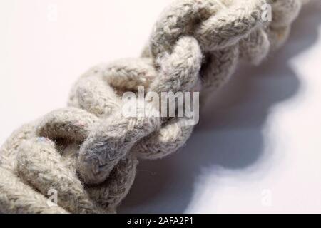 a thick rope that is braided, which may have been used on a ship Stock Photo