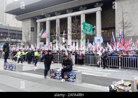 Seoul, South Korea - November 30th, 2019: Hundreds of people in march protesting against the Moon Jae-in administration. Stock Photo