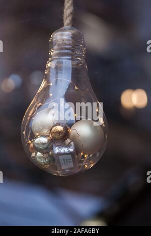 Decorative retro design edison light bulb. Christmas ornaments made from light bulbs. LED lamps in vintage and antique style. For loft and cafe. Stock Photo
