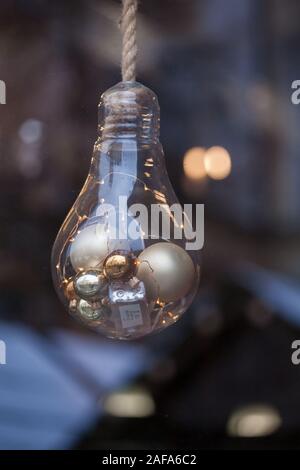 Decorative retro design edison light bulb. Christmas ornaments made from light bulbs. LED lamps in vintage and antique style. For loft and cafe. Stock Photo