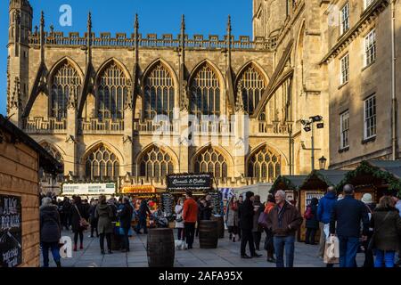 Bath, Somerset, UK, 13th December 2019 Stalls at the Bath Christmas market in front of the Abbey Stock Photo