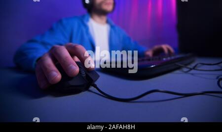 Technology ceoncept. Male hand on computer mouse Stock Photo