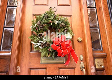 USA, Boston - January 2018 - House with christmas wreath on front door in Beacon Hill Area
