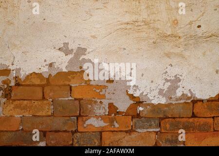 Closeup old grungy brick wall concrete texture background Stock Photo