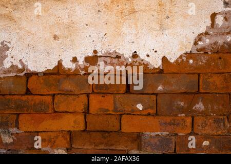 Closeup old grungy brick wall concrete texture background Stock Photo