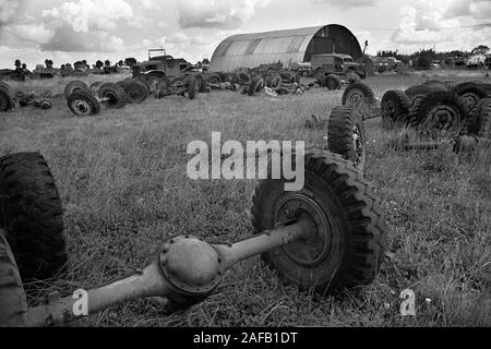 Second World War WW2 army military vehicles and cars dumped in French landscape.1960s Normandy France. 1967 HOMER SYKES Stock Photo