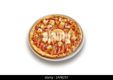 White plate with delicious hawaiian pizza isolated with clipping, path Stock Photo