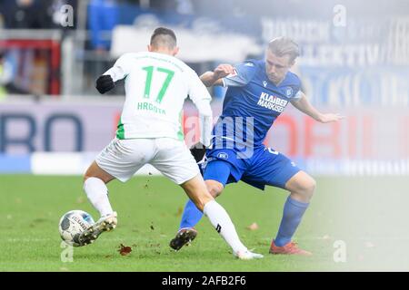 Marco Thiede (KSC) in duels with Branimir Hrgota (Fuerth). GES/Football/2nd Bundesliga: Karlsruher SC - Greuther Furth, 14.12.2019 Football/Soccer: 2nd League: Karlsruhe vs Fuerth, Karlsruhe, December 14, 2019 | usage worldwide Stock Photo