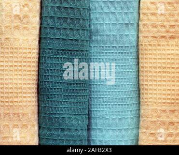 Mix color rolled towels. Top view. Yellow, green. mint and yellow Stock Photo