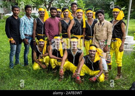 AMRAVATI, MAHARASHTRA, INDIA - AUGUST 9 : Group of Gondi tribes celebrating world tribal day by performing folk Dance in Amravati, Maharashtra, India Stock Photo