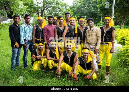 AMRAVATI, MAHARASHTRA, INDIA - AUGUST 9 : Group of Gondi tribes celebrating world tribal day by performing folk Dance in Amravati, Maharashtra, India Stock Photo