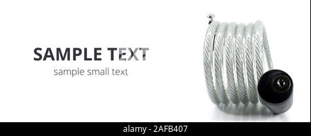 Silver bicycle lock for bike with key isolated on white background. Wide mockup for copy space. Stock Photo
