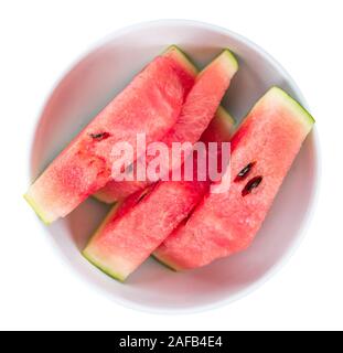 Sliced Watermelon isolated on white background (selective focus; close-up shot)