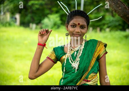 AMRAVATI, MAHARASHTRA, INDIA - AUGUST 9 : Group of Gondi tribes celebrating world tribal day by performing folk Dance in Amravati, Maharashtra, India Stock Photo