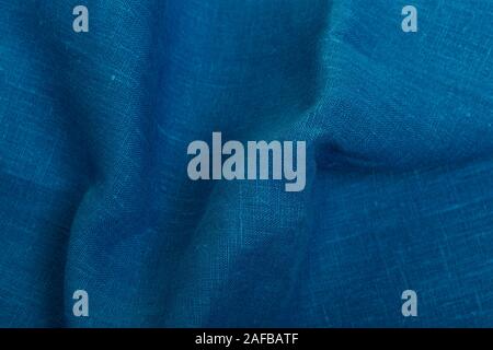 Classic blue fabric blank canvas, cotton or linen texture, 2020 fabric trendy color swatch for clothes, interior. Stock Photo