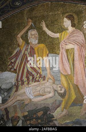 Mosaic depicts the Binding of Isaac decorates the wall at the entrance to the Calvary or Golgotha traditionally regarded as the site of Jesus' crucifixion on the upper level of the Church of Holy Sepulchre in the Christian quarter  Old City of East Jerusalem Israel Stock Photo