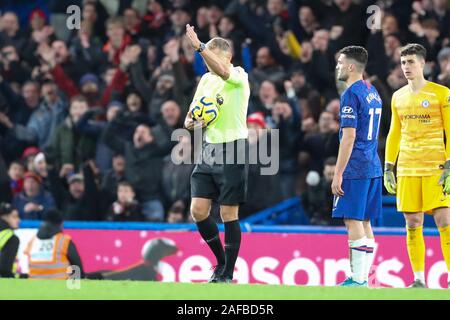 London, UK. 14th Dec, 2019.  Referee Graham Scott gives the goal after VAR, during the Premier League match between Chelsea and Bournemouth at Stamford Bridge, London on Saturday 14th December 2019. (Credit: John Cripps | MI News) Photograph may only be used for newspaper and/or magazine editorial purposes, license required for commercial use Credit: MI News & Sport /Alamy Live News Stock Photo