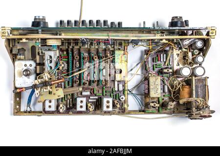 old tube chips with vintage transistors and resistors. small focusing area, selective focus. top view on white isolated background Stock Photo