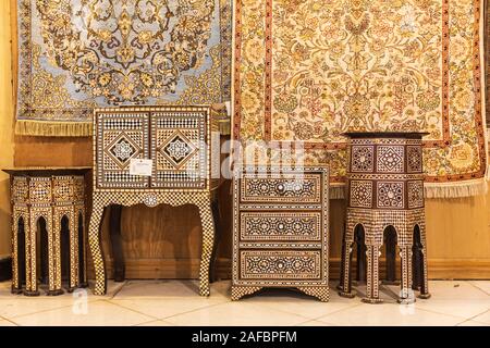 Africa, Egypt, Giza. Cairo. October 4, 2018. Hand crafted furniture with inlaid wood with mother-of-pearl accents in a sales shop. Stock Photo